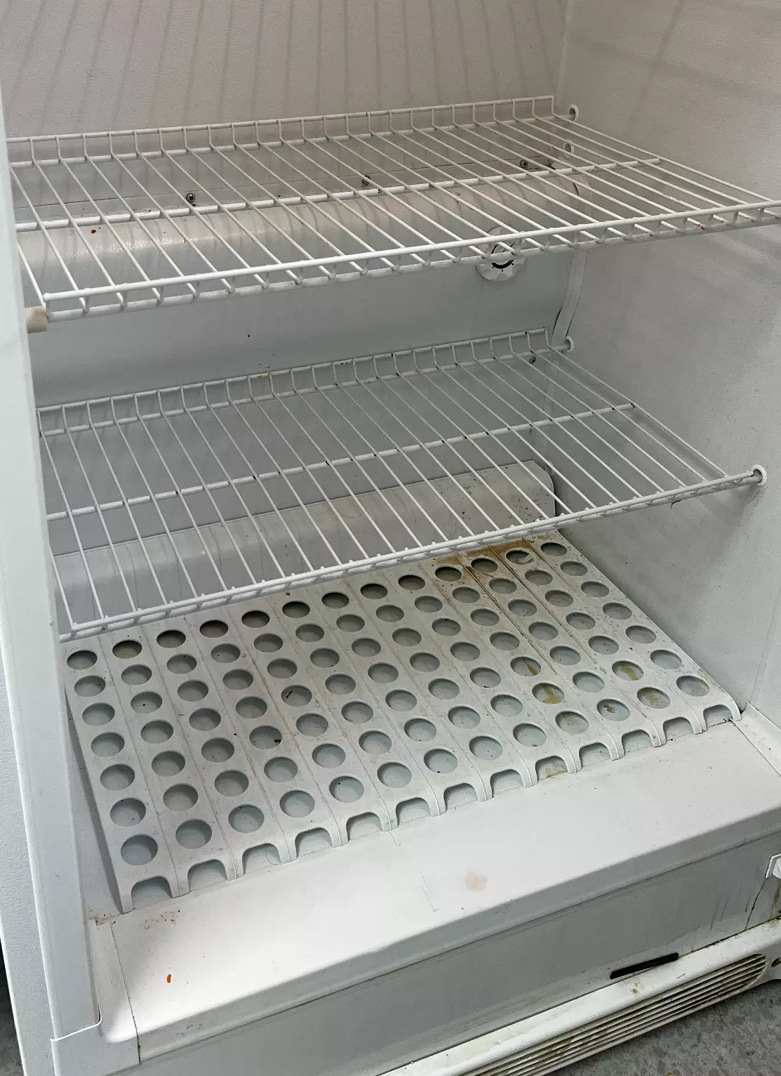 sparkling dirty refrigerator before Too Good Maids cleaning